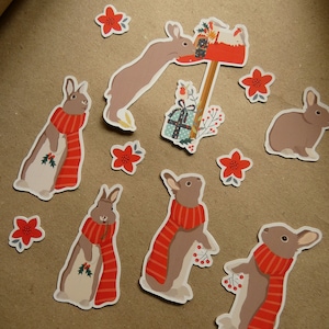 Lote de 11 pegatinas "Petit lapin de Noël". Pegatinas parfaits para embellecer tus paquetes cadeaux de Noël.