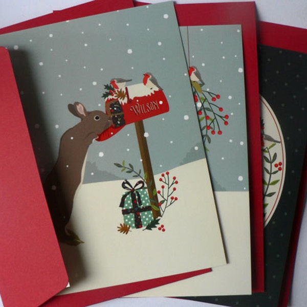 Set of 3 Christmas bunny postcards featuring a Christmas bunny in the snow with red envelopes