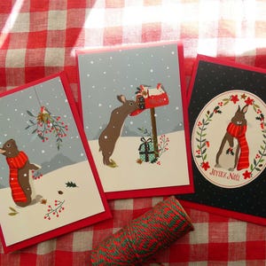 Lot de 3 cartes postales de Noël : petit lapin sous la neige