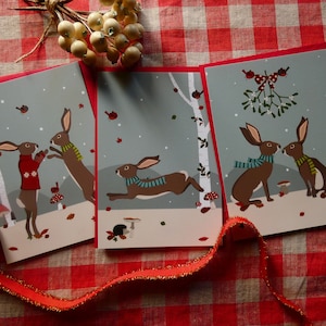 Lot de 3 cartes postales de Noël : lapins  de Noël sous la neige