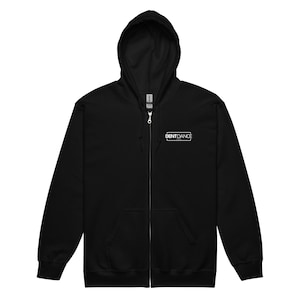 May include: A black zip-up hoodie with a hood and front pockets. The hoodie features the white text "DENTDANCE" in a rectangular box on the upper chest. The hoodie is made of a soft material and has a full zipper.