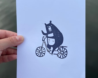 Bear on Bicyle Linocut Print