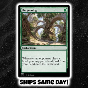 May include: A green Burgeoning card with an illustration of a landscape with archways. The card text reads "Enchantment" and describes a game mechanic. The card is set against a black background.