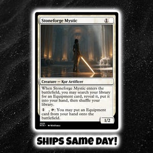 May include: A Stoneforge Mystic trading card featuring a Kor Artificer creature illustration. The card displays the name, mana cost, creature type, game text, and power/toughness stats of 1/2. The artwork depicts a figure in a grand hall.