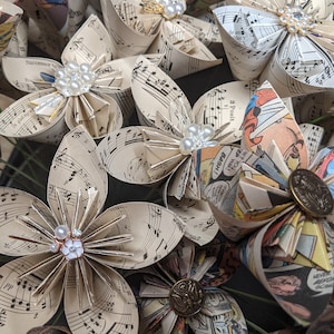 Bouquet of 6 vintage sheet music paper flowers with vintage buttons in the center. On long wrapped wire stems. Great for weddings, gifts.