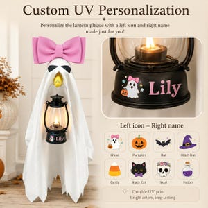 May include: A white ghost decoration featuring a large pink bow on top and holding a black lantern. The lantern base displays a custom graphic of a ghost with a pumpkin and the name Lily in pink text, with a chart showing various icon options.