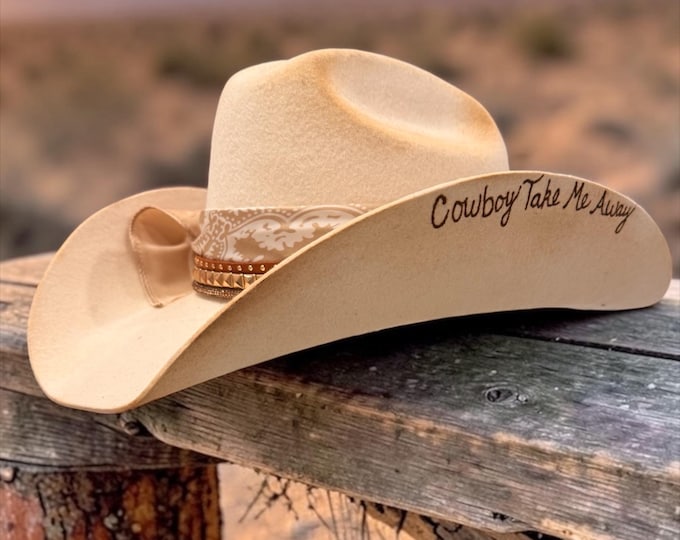 100% wool ivory cowboy hat with satin bandana and gold embellishments