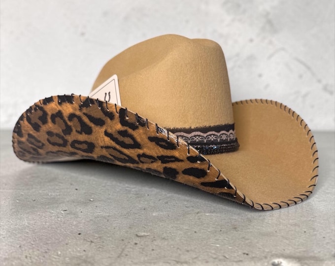 100% wool tan cowboy hat with leopard print fabric handstitched to brim