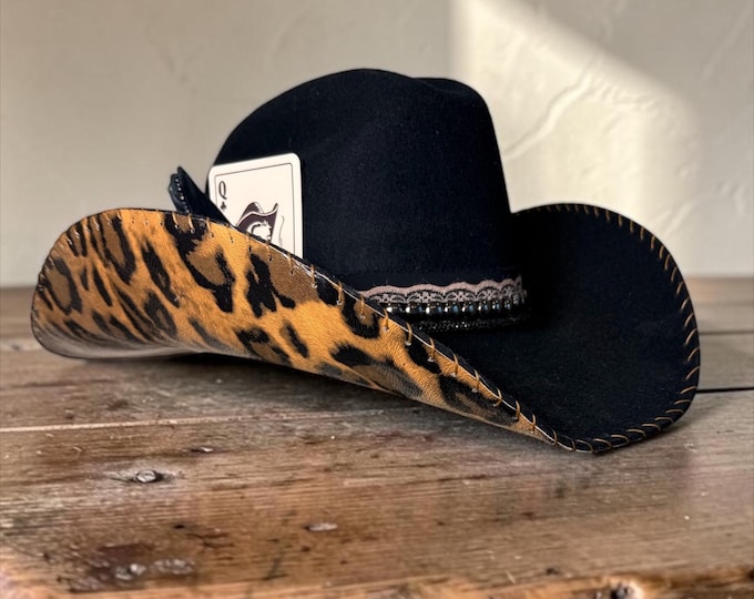 100% wool black cowboy hat with leopard print fabric handstitched to brim