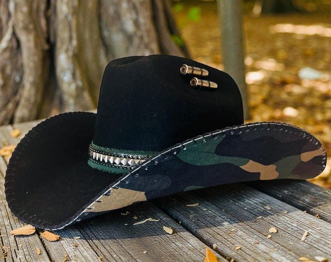 100% wool black cowboy hat with camo suede like fabric handstitched to brim