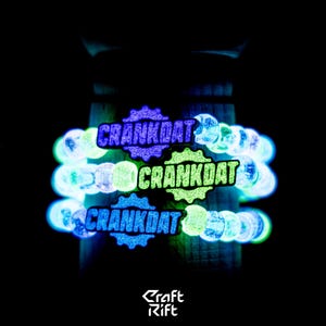 May include: Three glowing bracelets with the word "CRANKDAT" in neon blue, green, and purple. The bracelets are made of small, round, glowing beads. The background is black, with the "Craft Rift" logo at the bottom.