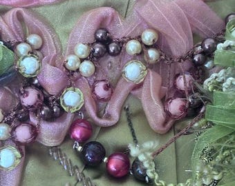 Vintage OOAK handcrafted clutch with metallic frame and crystal, bead, and ribbon embellishments