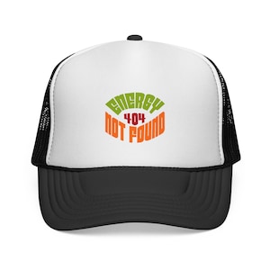 May include: A white and black trucker hat featuring a graphic on the front panel with the text ENERGY in green, 404 in red, and NOT FOUND in orange. The cap has a solid white front, a black brim, and black mesh side and back panels with a snapback.