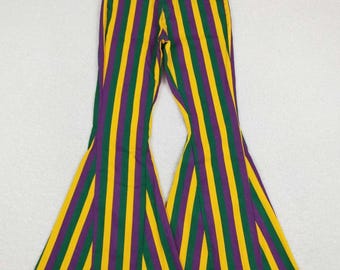May include: Flared trousers featuring vertical stripes in yellow, green, and purple. The trousers have a classic five-pocket design and a wide, bell-bottom style, ideal for a statement look.