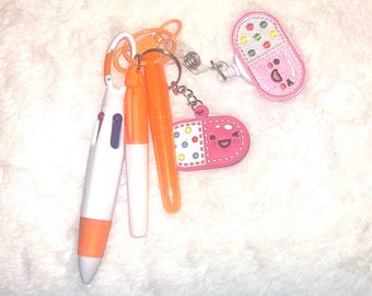 Stylish Orange Medical Badge Reel with Keychain Pen and Highlighter Marker