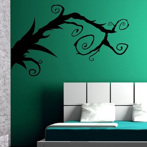 Swirly tree wall art featuring delicate fantasy-style branches and curls, adding whimsy and dimension for those who love enchanted, storybook-inspired decor. Corner wall branch that is made of vines and curly branches. Tree design that can be used for whimsigoth decor or Halloween decorations.