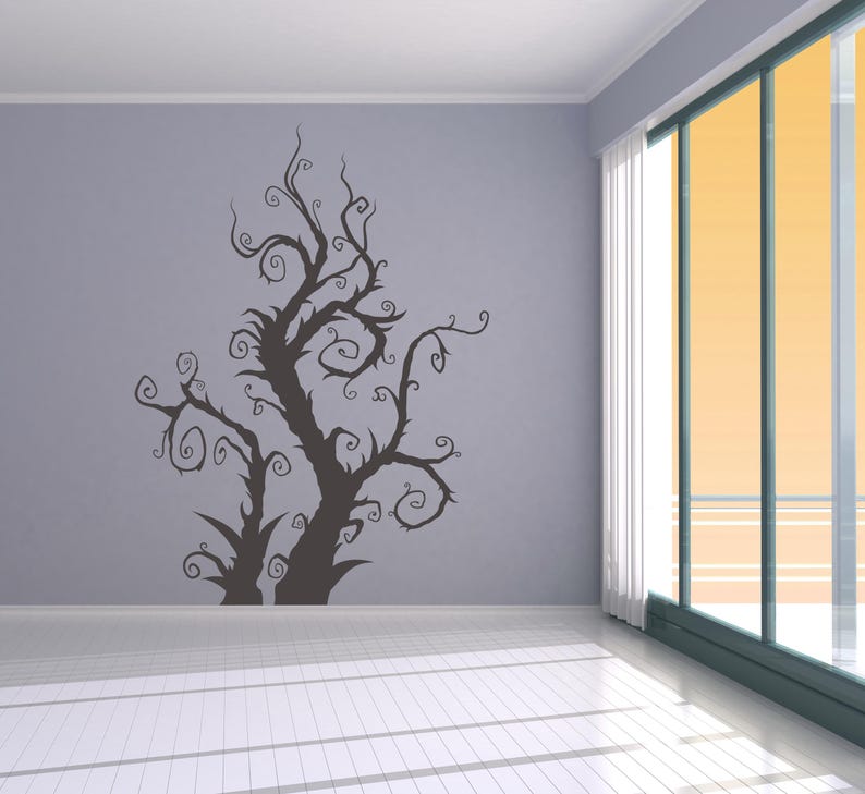 Whimsical tree decal showing dramatic curling limbs and flowing movement that feels magical, artistic, and slightly mysterious without heavy detail.