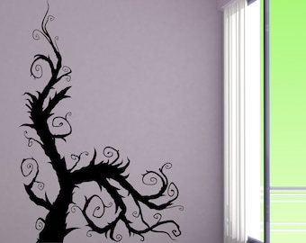 May include: A black silhouette of a stylized tree with twisting branches and curled leaves on a light purple wall.
