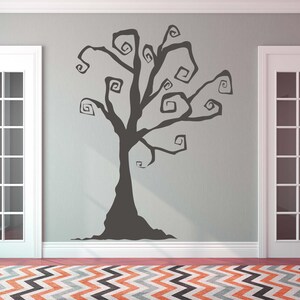 Whimsical gothic tree design for nursery or Halloween spaces.