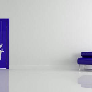 Playroom swing wall decal with a child silhouette, designed to spark gentle nostalgia and invite a soft sense of adventure and childhood memories.
