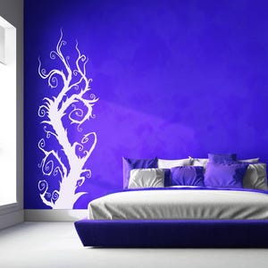 Whimsical tree art created with flowing branches and organic curves, offering a sense of imagination, transformation, and quiet magic through nature inspired form.
