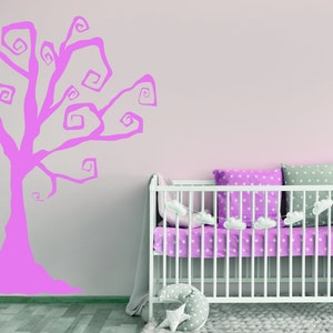 Nursery tree wall art featuring a dramatic gothic tree silhouette with curls.