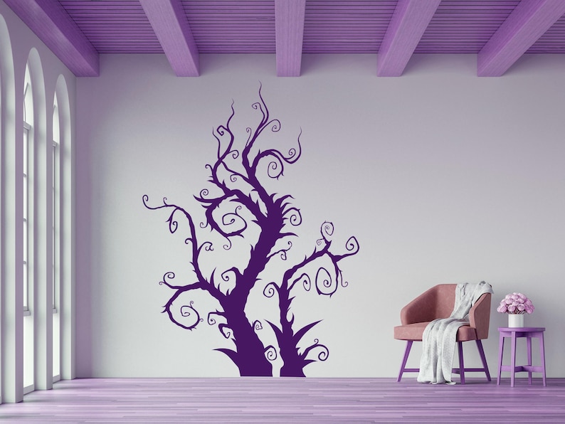 Whimsical tree art created with curling lines and dramatic shapes, bringing a sense of imagination and folklore into a space.