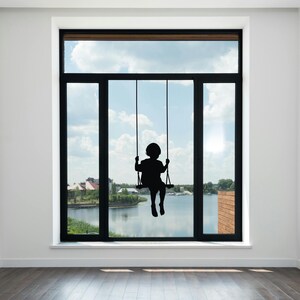 Silhouette swing wall artwork featuring a child sitting quietly in motion, made to create a comforting little moment of imagination and calm.