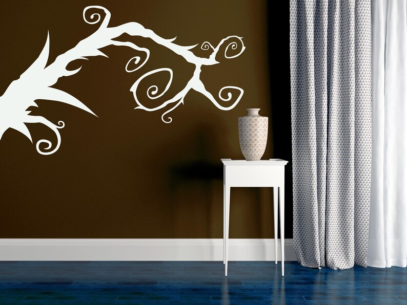 Renter-friendly branch wall decal designed for easy removal, with curling gothic vines that add instant mood and style without commitment.