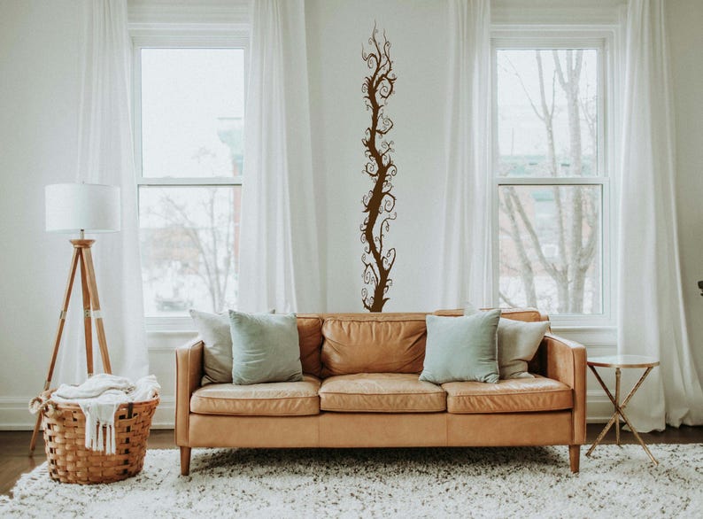 Vine wall decal works well for a renter who wants a tall statement piece that feels artistic and expressive without permanent changes.