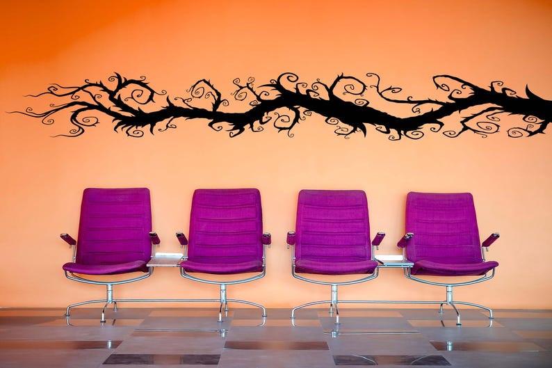 Fantasy tree wall art stretches upward with winding lines, creating the sense of motion and growth frozen in a single striking form.