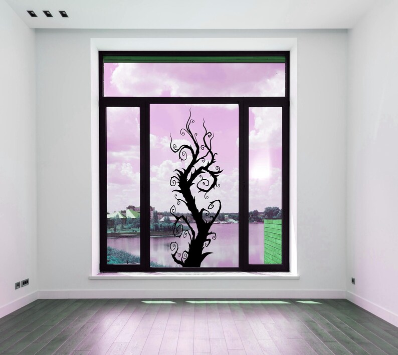 Curly branch art designed as a vertical statement tree, using motion and rhythm to create visual depth and emotional presence. Window decal sticker.