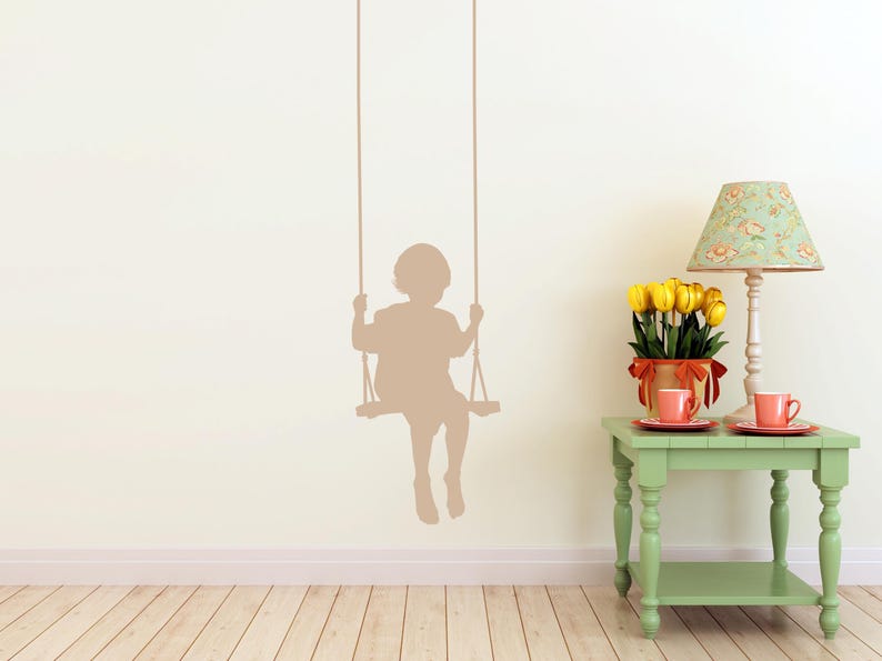Child swing stencil decal with a gentle silhouette design, offering a touch of childhood magic and a peaceful reminder of simple moments that stay with us.