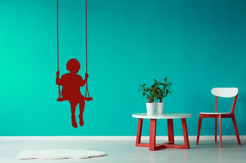 Kid swing silhouette decal offering a simple peaceful scene, perfect for adding a touch of whimsy and storytelling to everyday surroundings.