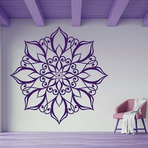May include: A purple mandala wall decal with intricate floral designs. The decal is applied to a white wall in a room with a purple ceiling and a purple floor.