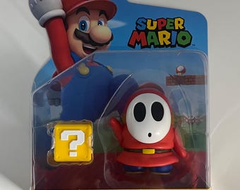 Figurka akcji Super Mario Shy Guy z tajemniczym pudełkiem - JAKKS 4"