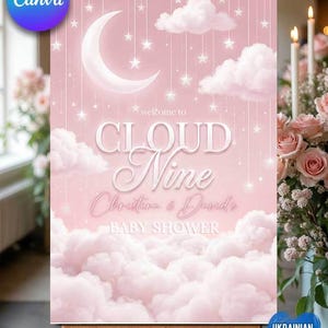May include: A pink baby shower sign with a crescent moon, stars, and clouds. The sign reads "Welcome to Cloud Nine Christina & David's Baby Shower." The sign is displayed on a wooden easel.