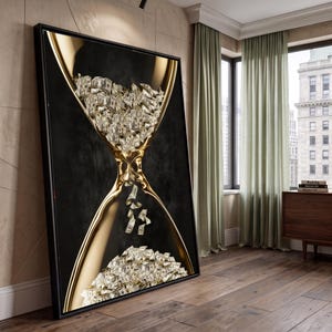 May include: A rectangular wall art piece featuring a large gold hourglass against a black background. The hourglass is filled with numerous dollar bills, with some bills falling through the centre neck into the bottom chamber.