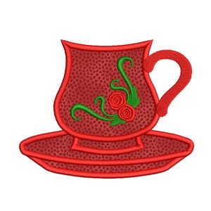 May include: Red teacup and saucer embroidery design with a textured pattern. The teacup features a curved handle and is decorated with green vines and red roses. The saucer is round and matches the teacup's design.