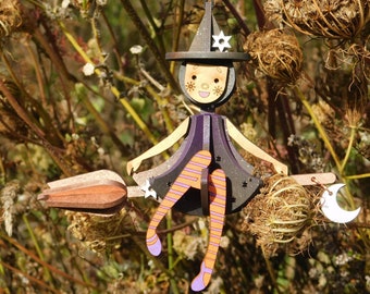 pequeña bruja volando en una escoba colgando decoración de halloween; corte por láser / mdf cortado por láser