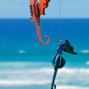 hanging seahorse decoration. laser cut / lasercut mdf one of each