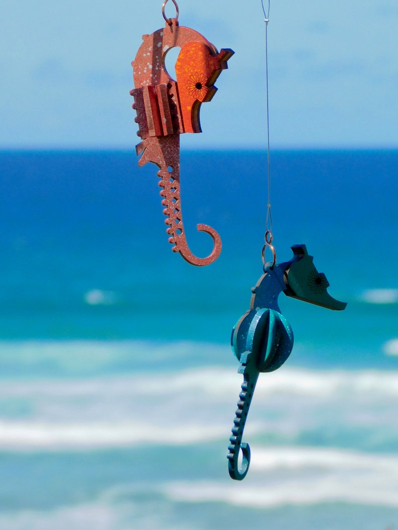 hanging seahorse decoration. laser cut / lasercut mdf one of each