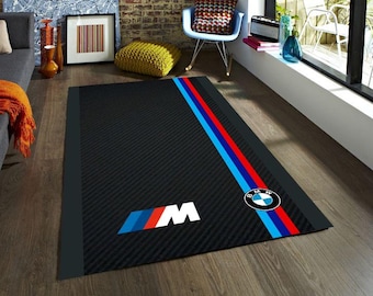 BMW M Streifenteppich, Autoteppich im schwarzen Carbon-Stil, vom Motorsport inspirierter Bodenteppich, modernes Automobildekor für die Werkstatt des Mannes