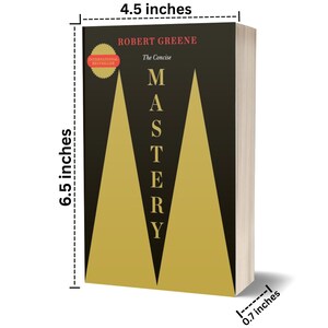 May include: A hardcover book titled "Mastery" by Robert Greene. The book is 6.5 inches tall, 4.5 inches wide, and 0.7 inches thick. The cover is black with gold geometric shapes and the title in large, bold letters. An "International Bestseller" seal is visible.