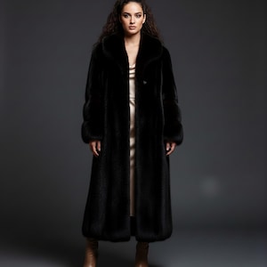 May include: Full-length black faux fur coat with a wide collar and button closure. The coat is worn over a light-colored dress and paired with brown ankle boots. The coat's texture is soft and plush, creating a luxurious look.