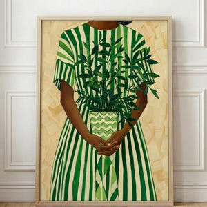 May include: A framed art print featuring a person in a green and white striped dress holding a potted plant with green leaves. The plant pot has a green and white zigzag pattern. The background is a light beige color.