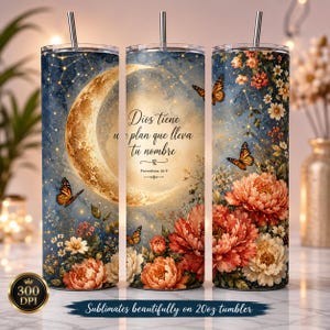May include: Three 20oz tumblers with straws featuring a celestial design with a golden crescent moon, orange butterflies, and floral patterns. The center tumbler displays the Spanish text: Dios tiene un plan que lleva tu nombre Proverbios 16:9.