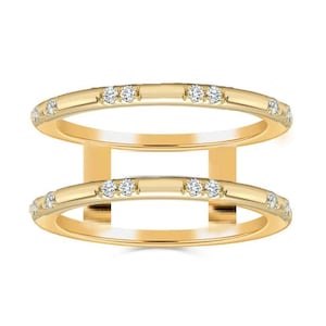 May include: A set of three ceramic mugs with a speckled, matte finish in cream, light grey, and dark grey. Each mug has a simple, minimalist design and a rounded handle.