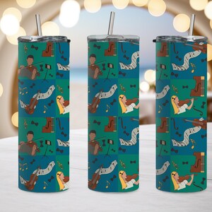 May include: Three stainless steel insulated tumblers with a musical theme. The design features a repeating pattern of musicians, violins, musical notes, and bow ties on a teal and green background. Each tumbler has a silver straw.
