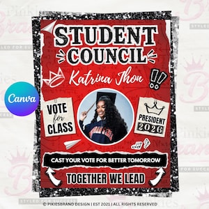 May include: A red and black Student Council campaign poster featuring the name "Katrina Thon" and the text "President 2026." The poster includes a photo of a person wearing a graduation cap and gown, with the phrases "Vote for Class" and "Together We Lead."